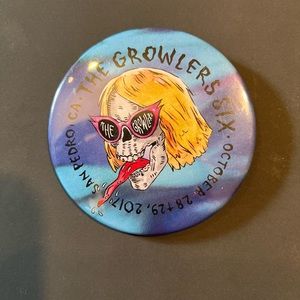 The growlers pin back button